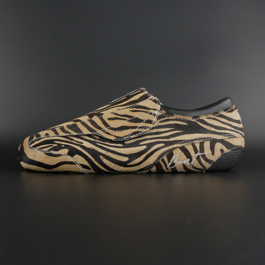 Side view of Envy Zebra Print Roller Skate showing Zebra pattern