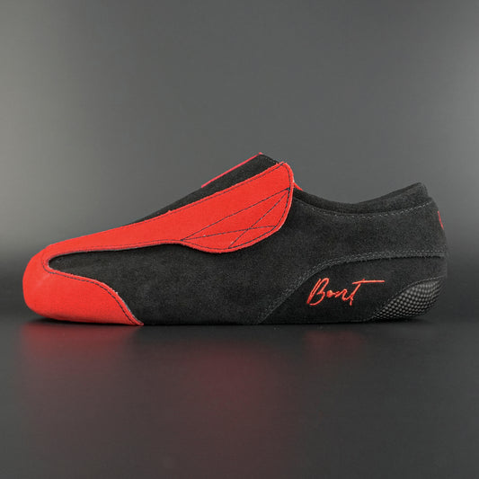 Side view of the Envy suede skate showing blue and black suede finish