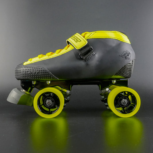 Side view of limited edition skate with Hybrid Carbon boot, Athena plate, and Royal Assassin wheels