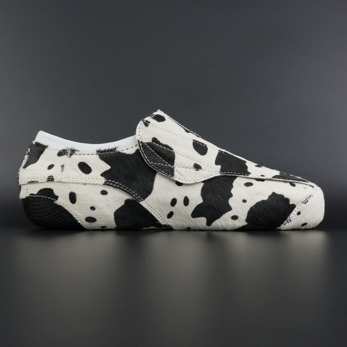 Close-up of cowhide texture and carbon base