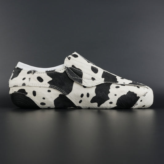 Close-up of cowhide texture and carbon base