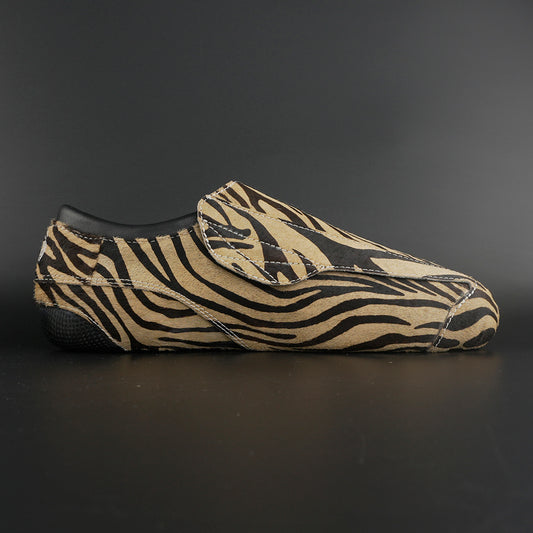 Close-up of Genuine Leather with Fur & Zebra Print Style and carbon base