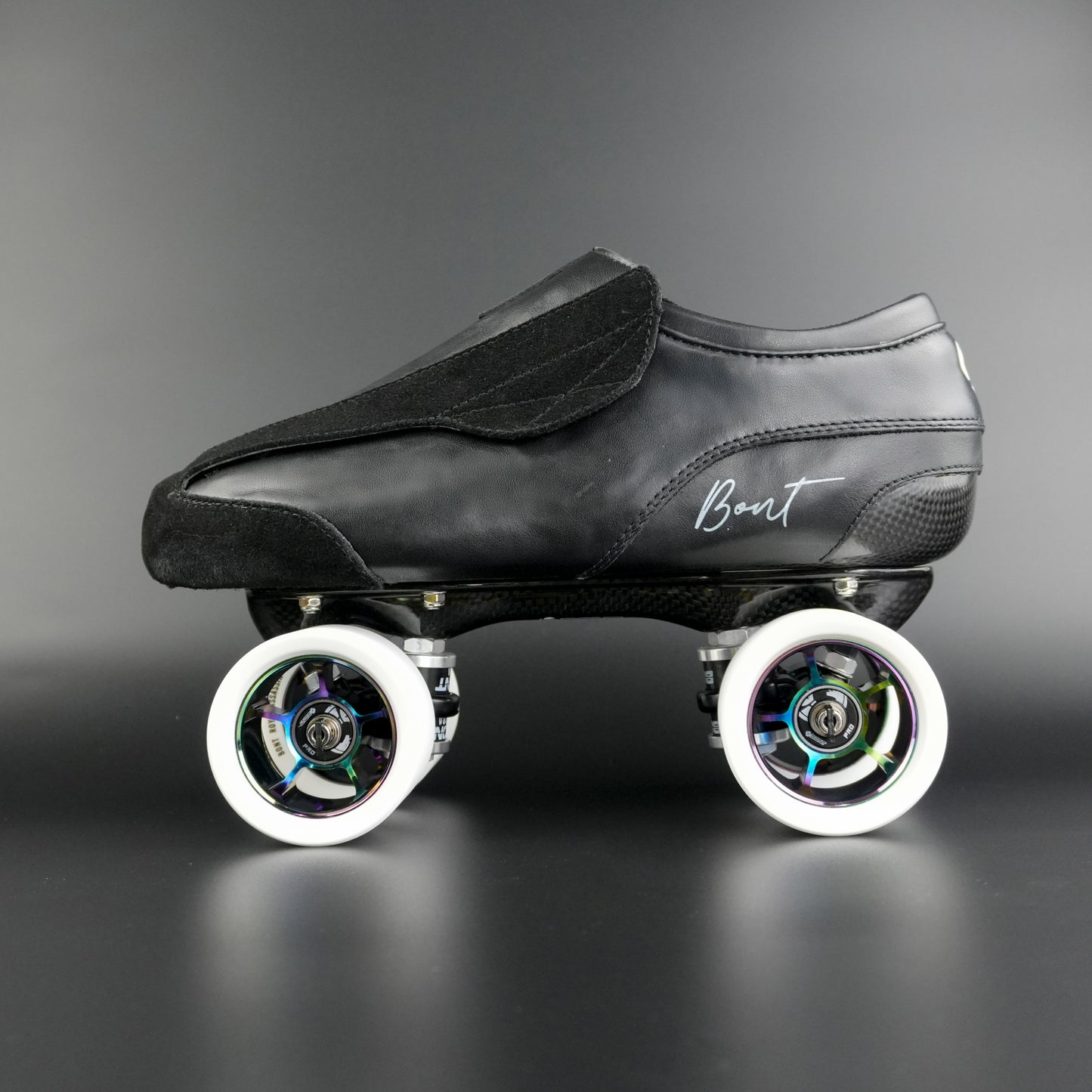 Side view of the Envy suede skate showing blue and black suede finish