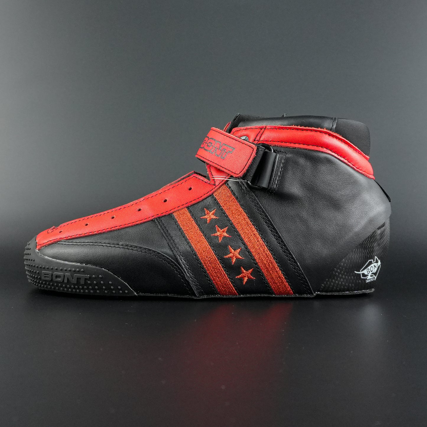 Side view of the limited edition black and red quad skate