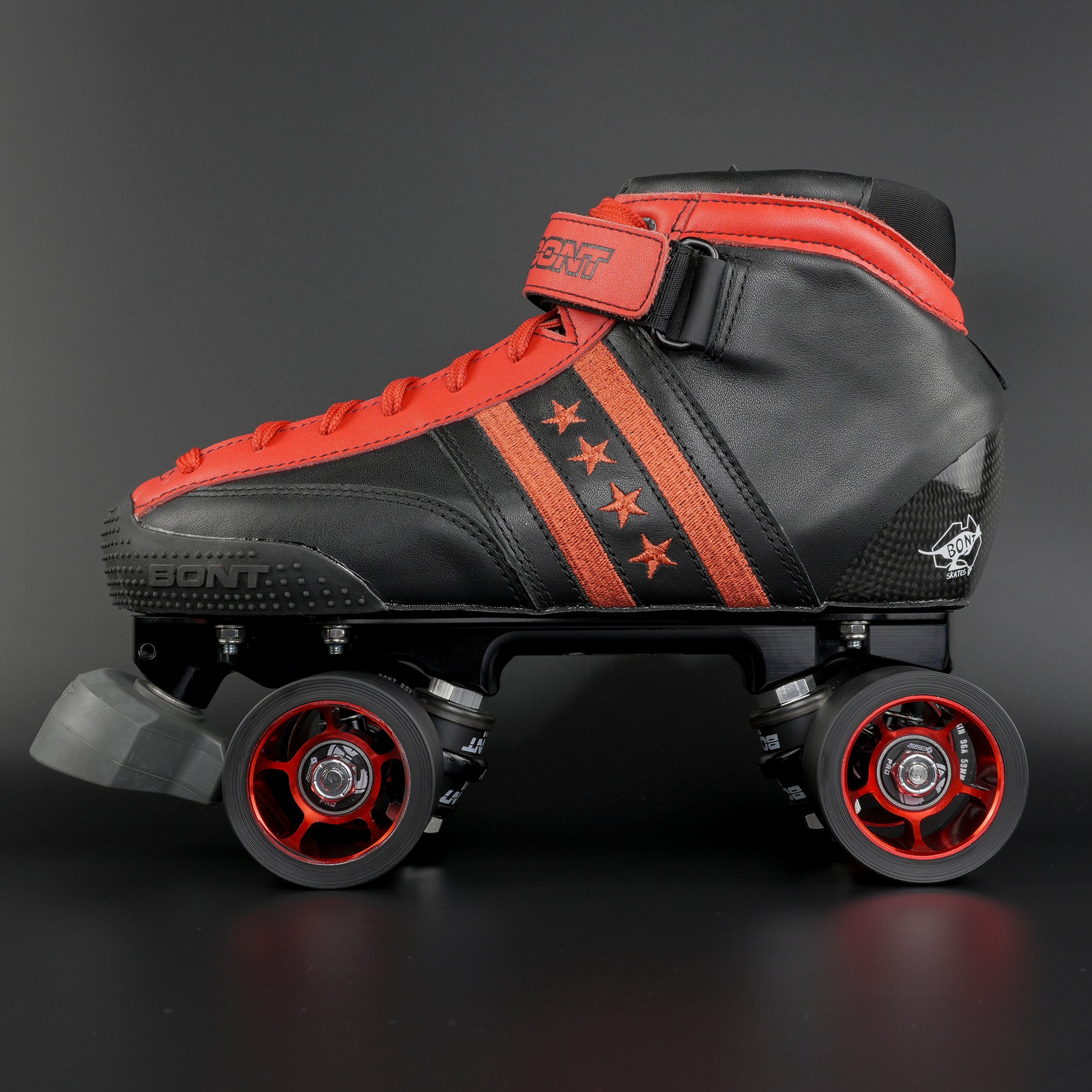 Side view of the limited edition black and red quad skate with 59 mm wheels