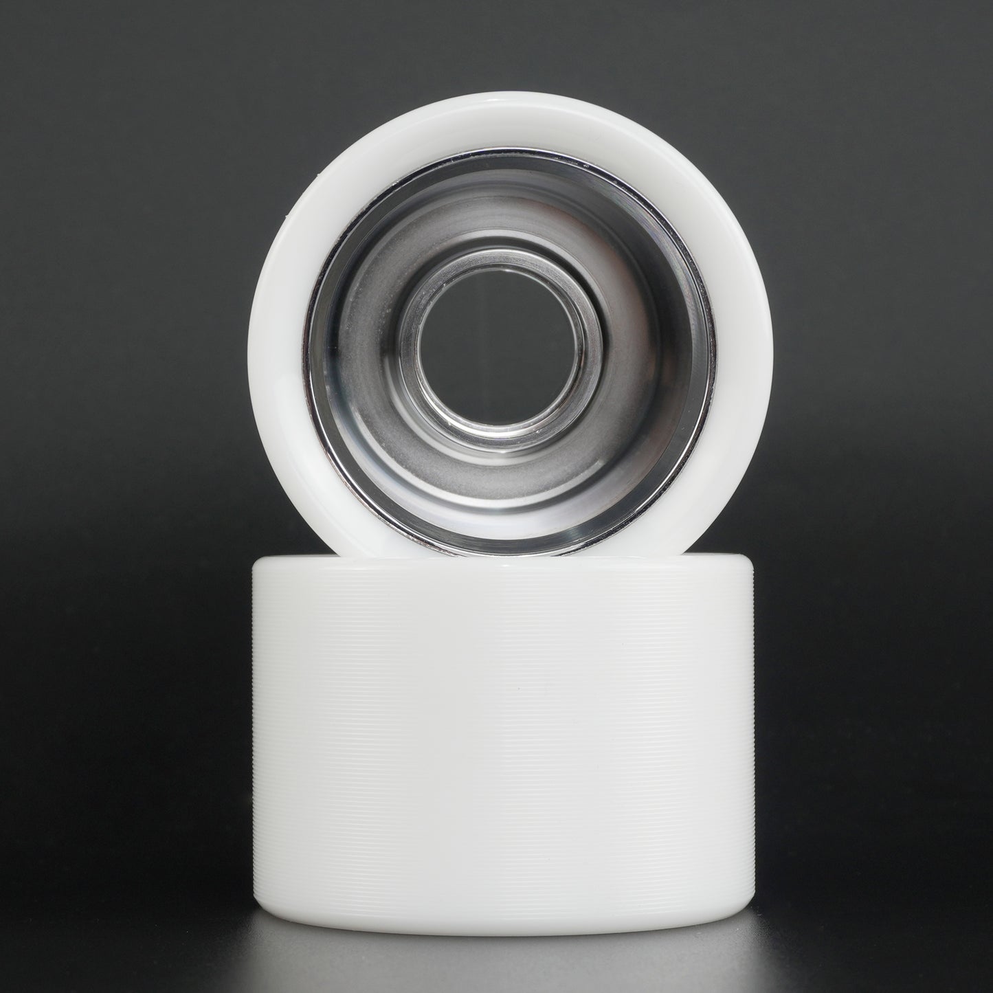 Ultraglide wheel mounted on a quad skate for indoor rink use